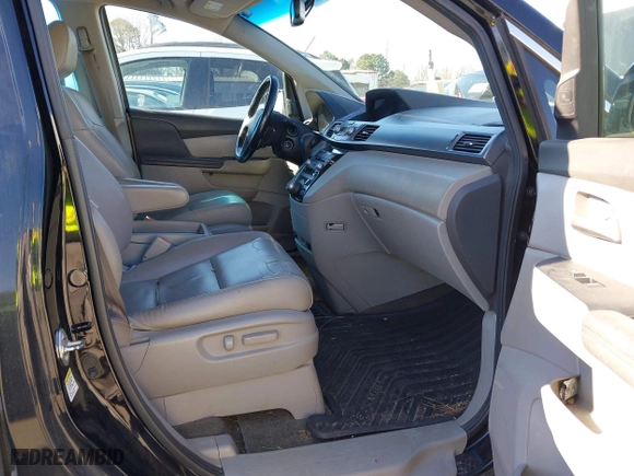 2013 Honda Odyssey Touring with VIN 5FNRL5H99DB076385, listed as a IAAI auction lot 41751504 with 233,875 mi miles. Bid and sale history available at carsss.com. Image 5.