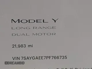 2023 Tesla Model Y Long Range with VIN 7SAYGAEE7PF766735, listed as a IAAI auction lot 41626651 with 21,983 mi miles. Bid and sale history available at carsss.com. Image 16.
