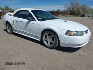 1999 Ford Mustang GT z VIN 1FAFP45X1XF215757, wystawiony jako IAAI lot #42311086 z przebiegiem 138 832 mil mil oraz . Historia ofert i sprzedaży dostępna na DreamBid. Obrazek 1.