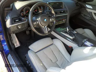 2015 BMW M6 z VIN WBSLZ9C55FD651441, wystawiony jako Copart lot #78511203 z przebiegiem 45 569 mil mil oraz Czysty tytuł • Clean title. Historia ofert i sprzedaży dostępna na DreamBid. Obrazek 8.