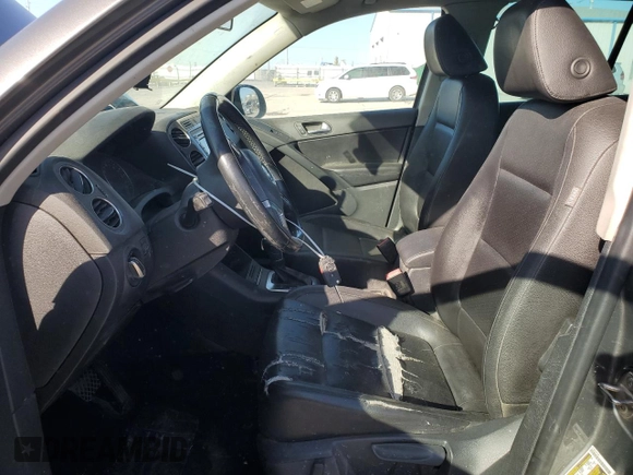 2012 Volkswagen Tiguan SE with VIN WVGAV7AX8CW080123, listed as a Copart auction lot 88922235 with 159,093 mi miles and Salvage Title. Bid and sale history available at DreamBid. Image 7.