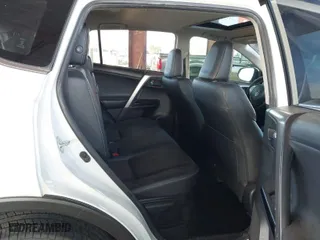 2016 Toyota RAV4 Hybrid Limited with VIN JTMDJREV6GD016181, listed as a IAAI auction lot 41616922 with 95,037 mi miles. Bid and sale history available at carsss.com. Image 5.