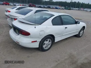 1999 Pontiac Sunfire SE z VIN 1G2JB1247X7582141, wystawiony jako IAAI lot #42198418 z przebiegiem Nie podano mil oraz . Historia ofert i sprzedaży dostępna na DreamBid. Obrazek 4.