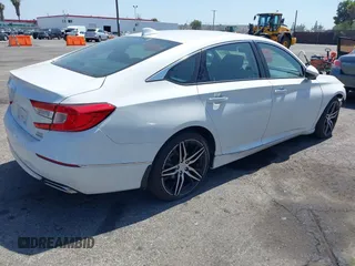 2021 Honda Accord Touring with VIN 1HGCV2F92MA024124, listed as a IAAI auction lot 42353443 with 22,457 mi miles and . Bid and sale history available at DreamBid. Image 4.
