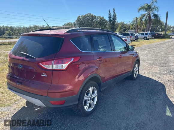 2013 Ford Escape SE with VIN 1FMCU9G95DUD25554, listed as a Copart auction lot 83068844 with Not provided miles and Clean title. Bid and sale history available at DreamBid. Image 4.