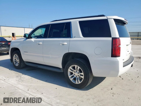 2015 Chevrolet Tahoe LT with VIN 1GNSCBKC5FR185631, listed as a Copart auction lot 60427395 with 125,616 mi miles and Clean title. Bid and sale history available at DreamBid. Image 2.