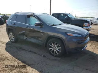 2014 Jeep Cherokee Limited with VIN 1C4PJMDB2EW215897, listed as a Copart auction lot 59576765 with 107,071 mi miles and Salvage title. Bid and sale history available at DreamBid. Image 4.