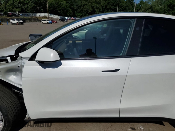2024 Tesla Model Y Long Range с VIN 7SAYGDEE2RA257279, выставлен на аукционе Copart как лот 61248255 с пробегом Не указан миль и Списание • Salvage title. История ставок и продаж доступна на DreamBid. Изображение 7.