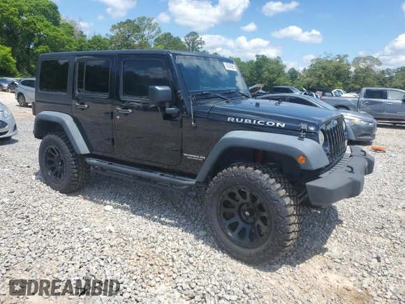 2015 Jeep Wrangler Unlimited Rubicon z VIN 1C4BJWFG2FL530863, wystawiony jako Copart lot #56345965 z przebiegiem 149 754 mil mil oraz Szkoda całkowita • Salvage title. Historia ofert i sprzedaży dostępna na DreamBid. Obrazek 4.