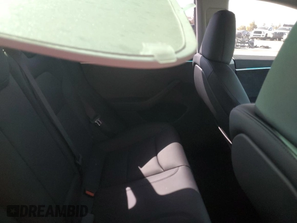 2025 Tesla Model 3 Long Range z VIN 5YJ3E1EB0SF986178, wystawiony jako Copart lot #57612115 z przebiegiem Nie podano mil oraz Szkoda całkowita • Salvage title. Historia ofert i sprzedaży dostępna na DreamBid. Obrazek 10.