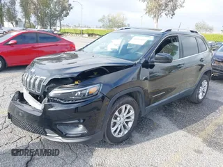 2019 Jeep Cherokee Latitude with VIN 1C4PJLCB8KD215423, listed as a IAAI auction lot 41911882 with 76,965 mi miles. Bid and sale history available at carsss.com. Image 17.