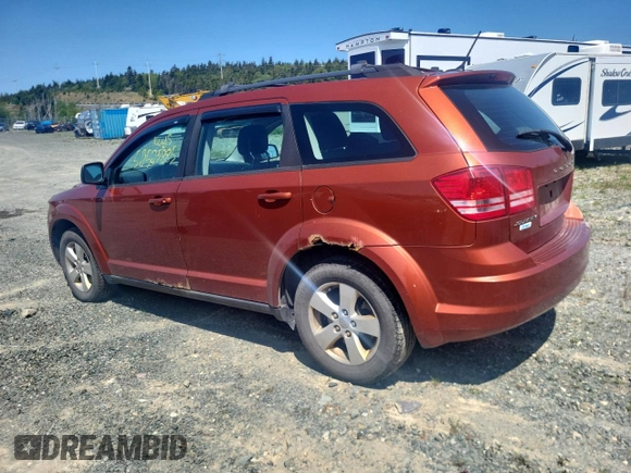 2013 Dodge Journey American Value z VIN 3C4PDCAB1DT656317, wystawiony jako Copart lot #58525885 z przebiegiem 210 834 mil mil oraz Szkoda całkowita • Salvage title. Historia ofert i sprzedaży dostępna na DreamBid. Obrazek 2.
