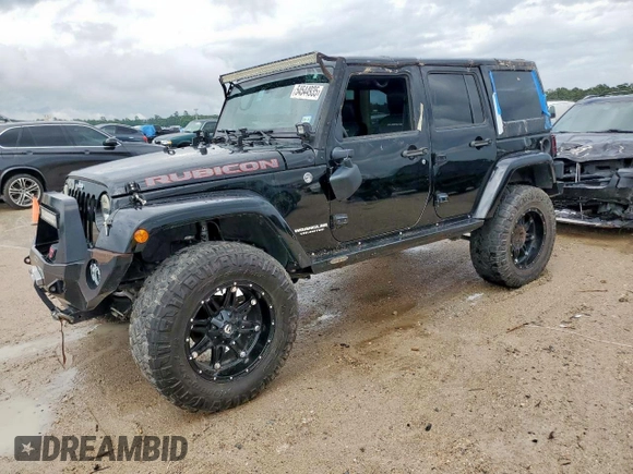 2015 Jeep Wrangler Unlimited Rubicon Hard Rock with VIN 1C4HJWFG1FL710264, listed as a Copart auction lot 54123285 with 96,737 mi miles and Salvage title. Bid and sale history available at DreamBid. Image 1.