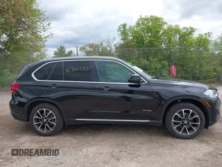 2016 BMW X5 xDrive35i z VIN 5UXKR0C59G0S89653, wystawiony jako IAAI lot #42300682 z przebiegiem 130 059 mil mil oraz . Historia ofert i sprzedaży dostępna na DreamBid. Obrazek 13.