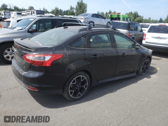 2013 Ford Focus SE with VIN 1FADP3F23DL373924, listed as a Copart auction lot 60703875 with 75,171 mi miles and Clean title. Bid and sale history available at DreamBid. Image 3.