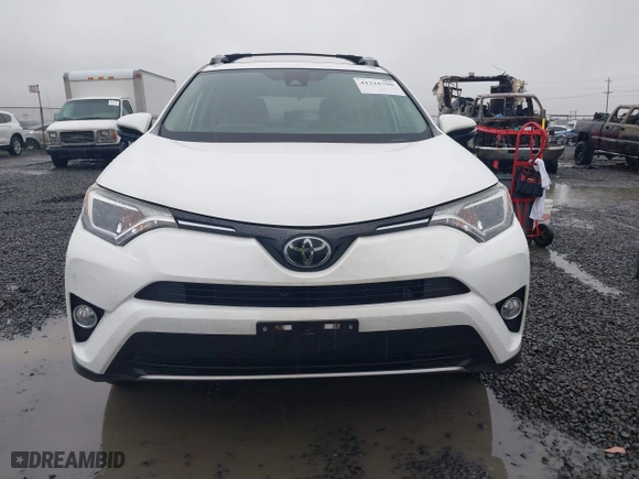 2017 Toyota RAV4 XLE with VIN JTMRFREV2HD212188, listed as a IAAI auction lot 41216790 with 79,594 mi miles. Bid and sale history available at carsss.com. Image 13.