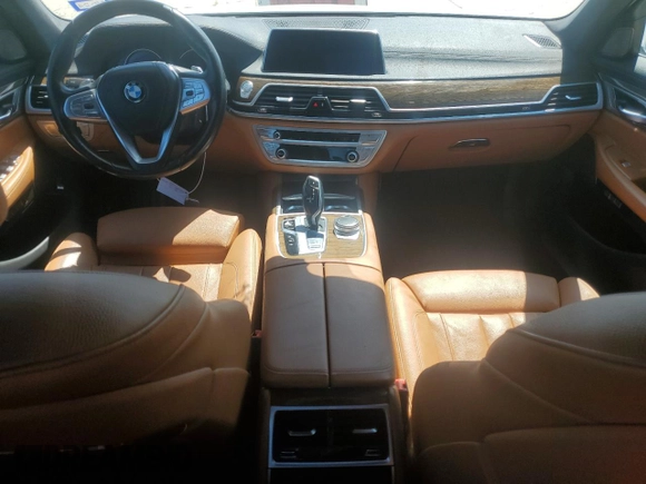 2018 BMW 7 Series 740i xDrive with VIN WBA7E4C52JGV24125, listed as a Copart auction lot 48164214 with 77,695 mi miles. Bid and sale history available at carsss.com. Image 8.