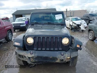 2018 Jeep Wrangler Sport S with VIN 1C4GJXAG4JW168920, listed as a IAAI auction lot 41457619 with 84,053 mi miles and . Bid and sale history available at DreamBid. Image 12.