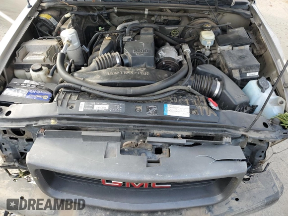 1998 GMC Sonoma z VIN 1GTCS1444WK508883, wystawiony jako Copart lot #76282634 z przebiegiem 87 110 mil mil oraz Szkoda całkowita • Salvage title. Historia ofert i sprzedaży dostępna na DreamBid. Obrazek 11.