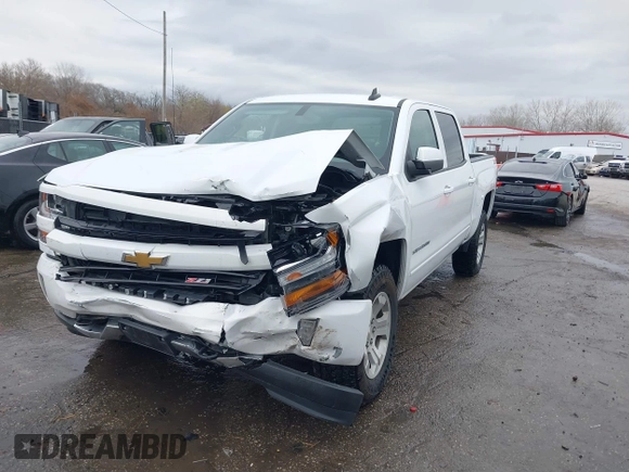 2018 Chevrolet Silverado 1500 LT with VIN 3GCUKREC3JG453433, listed as a IAAI auction lot 38138441 with 53,496 mi miles. Bid and sale history available at carsss.com. Image 2.
