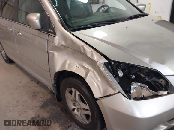2006 Honda Odyssey EX-L z VIN 5FNRL38746B461357, wystawiony jako IAAI lot #41040746 z przebiegiem 256 047 mil mil oraz . Historia ofert i sprzedaży dostępna na DreamBid. Obrazek 12.