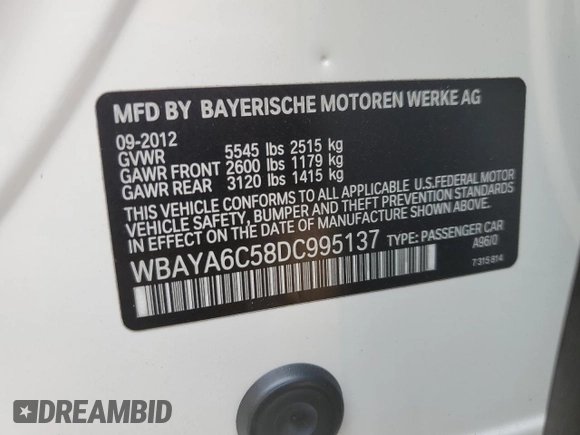 2013 BMW 7 Series 740i with VIN WBAYA6C58DC995137, listed as a Copart auction lot 75774104 with 61,847 mi miles and Salvage Title. Bid and sale history available at carsss.com. Image 13.