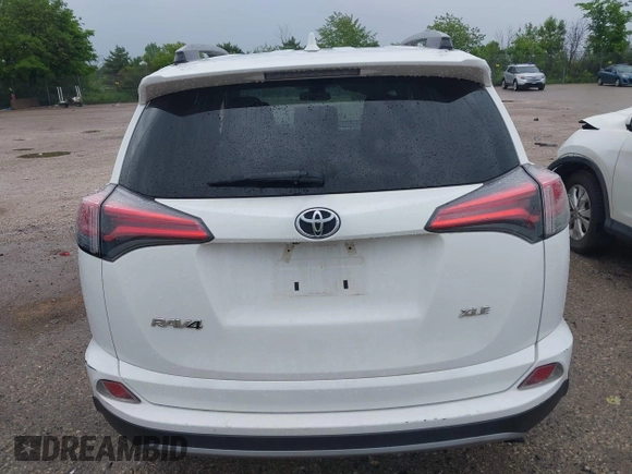 2018 Toyota RAV4 XLE with VIN 2T3WFREV4JW469929, listed as a IAAI auction lot 42536958 with 82,443 mi miles and . Bid and sale history available at DreamBid. Image 16.