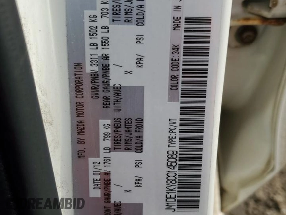 2012 Mazda 2 Sport with VIN JM1DE1KY8C0145089, listed as a Copart auction lot 52093925 with 211,282 mi miles and Salvage Title. Bid and sale history available at DreamBid. Image 12.