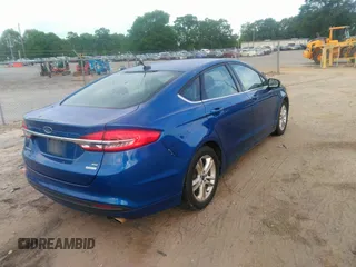 2018 Ford Fusion SE with VIN 3FA6P0HD1JR186717, listed as a IAAI auction lot 42076519 with 141,478 mi miles and . Bid and sale history available at DreamBid. Image 4.