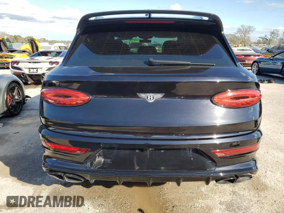 2022 Bentley Bentayga V8 z VIN SJAAM2ZV9NC013534, wystawiony jako Copart lot #74924334 z przebiegiem 10 200 mil mil oraz Nie do naprawy • Non repairable. Historia ofert i sprzedaży dostępna na DreamBid. Obrazek 6.