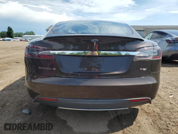 2014 Tesla Model S 60 with VIN 5YJSA1H17EFP31977, listed as a Copart auction lot 62521525 with Not provided miles and Clean title. Bid and sale history available at DreamBid. Image 6.
