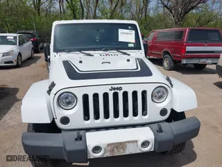 2012 Jeep Wrangler Unlimited Sahara with VIN 1C4HJWEG3CL254944, listed as a IAAI auction lot 42060981 with 172,358 mi miles. Bid and sale history available at carsss.com. Image 12.