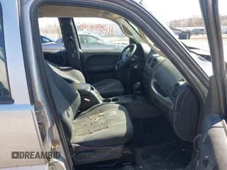 2004 Jeep Liberty Sport with VIN 1J4GL48K84W145318, listed as a IAAI auction lot 41885018 with 174,041 mi miles. Bid and sale history available at carsss.com. Image 5.