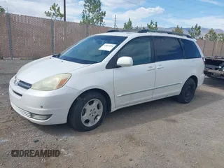 2004 Toyota Sienna XLE with VIN 5TDZA22C94S172859, listed as a IAAI auction lot 42057034 with 295,857 mi miles. Bid and sale history available at carsss.com. Image 2.