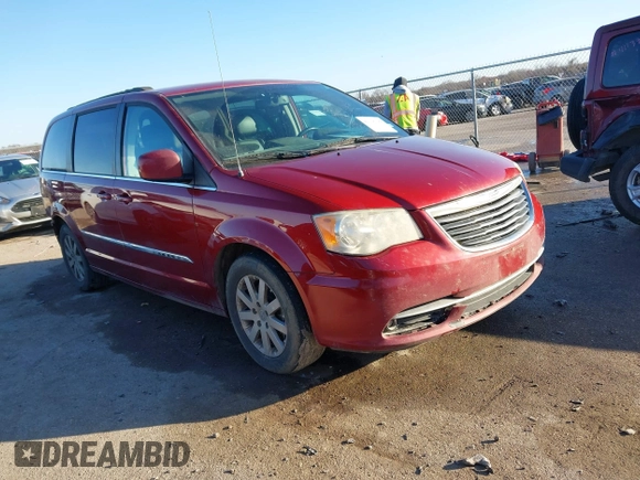 2013 Chrysler Town & Country Touring with VIN 2C4RC1BG2DR758951, listed as a IAAI auction lot 41136184 with 134,784 mi miles. Bid and sale history available at carsss.com. Image 1.