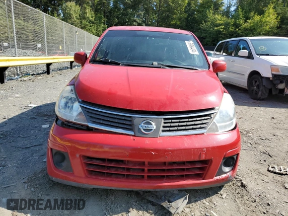 2009 Nissan Versa 1.8 S with VIN 3N1BC13E79L428938, listed as a Copart auction lot 69964494 with 146,587 mi miles and Salvage Title. Bid and sale history available at carsss.com. Image 5.