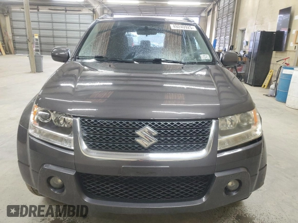 2012 Suzuki Grand Vitara Limited z VIN JS3TE0D78C4100383, wystawiony jako Copart lot #49240925 z przebiegiem 175 570 mil mil oraz Czysty tytuł • Clean title. Historia ofert i sprzedaży dostępna na DreamBid. Obrazek 5.