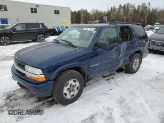 2004 Chevrolet Blazer LS z VIN 1GNDT13XX4K144034, wystawiony jako Copart lot #85671624 z przebiegiem 157 534 mil mil oraz Szkoda całkowita • Salvage title. Historia ofert i sprzedaży dostępna na DreamBid. Obrazek 1.