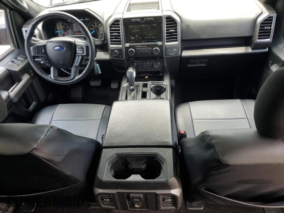 2015 Ford F-150 XLT with VIN 1FTEW1EG8FFC03207, listed as a Copart auction lot 59690515 with 261,153 mi miles and Salvage title. Bid and sale history available at DreamBid. Image 8.