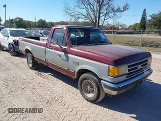 1991 Ford F-150 with VIN 2FTDF15N4MCB09103, listed as a IAAI auction lot 41015303 with 30,932 mi miles. Bid and sale history available at carsss.com. Image 1.