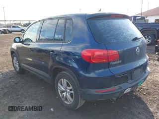 2014 Volkswagen Tiguan SE z VIN WVGAV3AX7EW541355, wystawiony jako IAAI lot #42032798 z przebiegiem 220 940 mil mil oraz . Historia ofert i sprzedaży dostępna na DreamBid. Obrazek 3.
