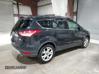 2013 Ford Escape SEL with VIN 1FMCU0H98DUD50796, listed as a Copart auction lot 64014515 with 209,791 mi miles and Salvage title. Bid and sale history available at DreamBid. Image 3.