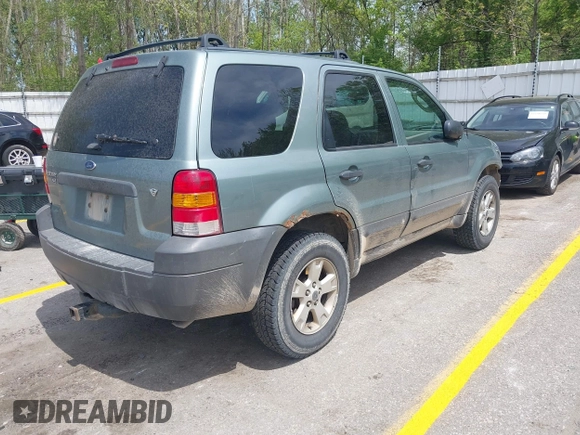 2006 Ford Escape XLT with VIN 1FMYU931X6KC71723, listed as a IAAI auction lot 42253154 with 148,959 mi miles and . Bid and sale history available at DreamBid. Image 4.