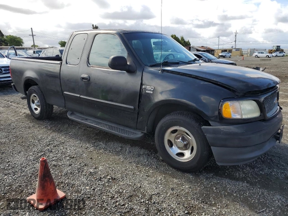 2001 Ford F-150 XL with VIN 1FTRX17W91NB71630, listed as a Copart auction lot 56583545 with 209,009 mi miles and Salvage title. Bid and sale history available at DreamBid. Image 4.