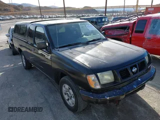 1999 Nissan Frontier XE z VIN 1N6DD26S6XC329964, wystawiony jako IAAI lot #41227011 z przebiegiem 199 039 mil mil oraz . Historia ofert i sprzedaży dostępna na DreamBid. Obrazek 1.