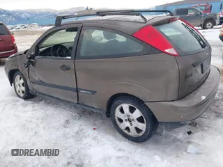 2000 Ford Focus ZX3 with VIN 3FAFP3137YR246156, listed as a IAAI auction lot 41330476 with 209,212 mi miles and . Bid and sale history available at DreamBid. Image 3.