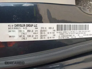 2013 Dodge Grand Caravan SXT with VIN 2C4RDGCGXDR749803, listed as a IAAI auction lot 42118722 with 264,454 mi miles and . Bid and sale history available at DreamBid. Image 9.