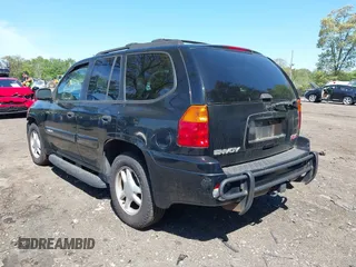 2005 GMC Envoy SLE z VIN 1GKDT13S452198027, wystawiony jako IAAI lot #42243258 z przebiegiem 144 240 mil mil oraz . Historia ofert i sprzedaży dostępna na DreamBid. Obrazek 3.