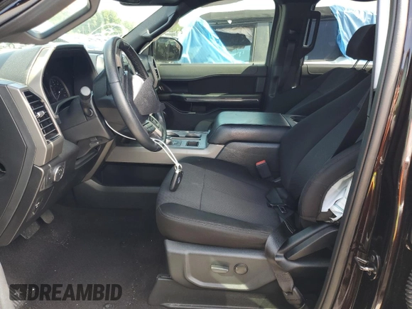 2021 Ford Expedition XLT with VIN 1FMJU1HT0MEA03496, listed as a Copart auction lot 57911685 with 96,462 mi miles and Salvage title. Bid and sale history available at DreamBid. Image 7.