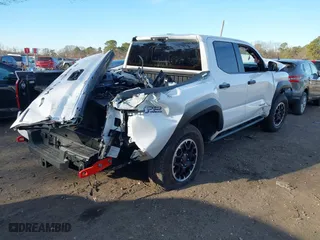 2024 Toyota Tacoma 4WD TRD Sport Hybrid with VIN 3TYLC5LN2RT003005, listed as a IAAI auction lot 41742427 with 1 mi miles. Bid and sale history available at carsss.com. Image 4.